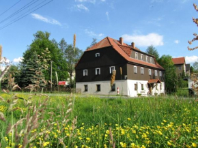 Отель Ferienwohnungen im Landstreicherhaus  Штольпен